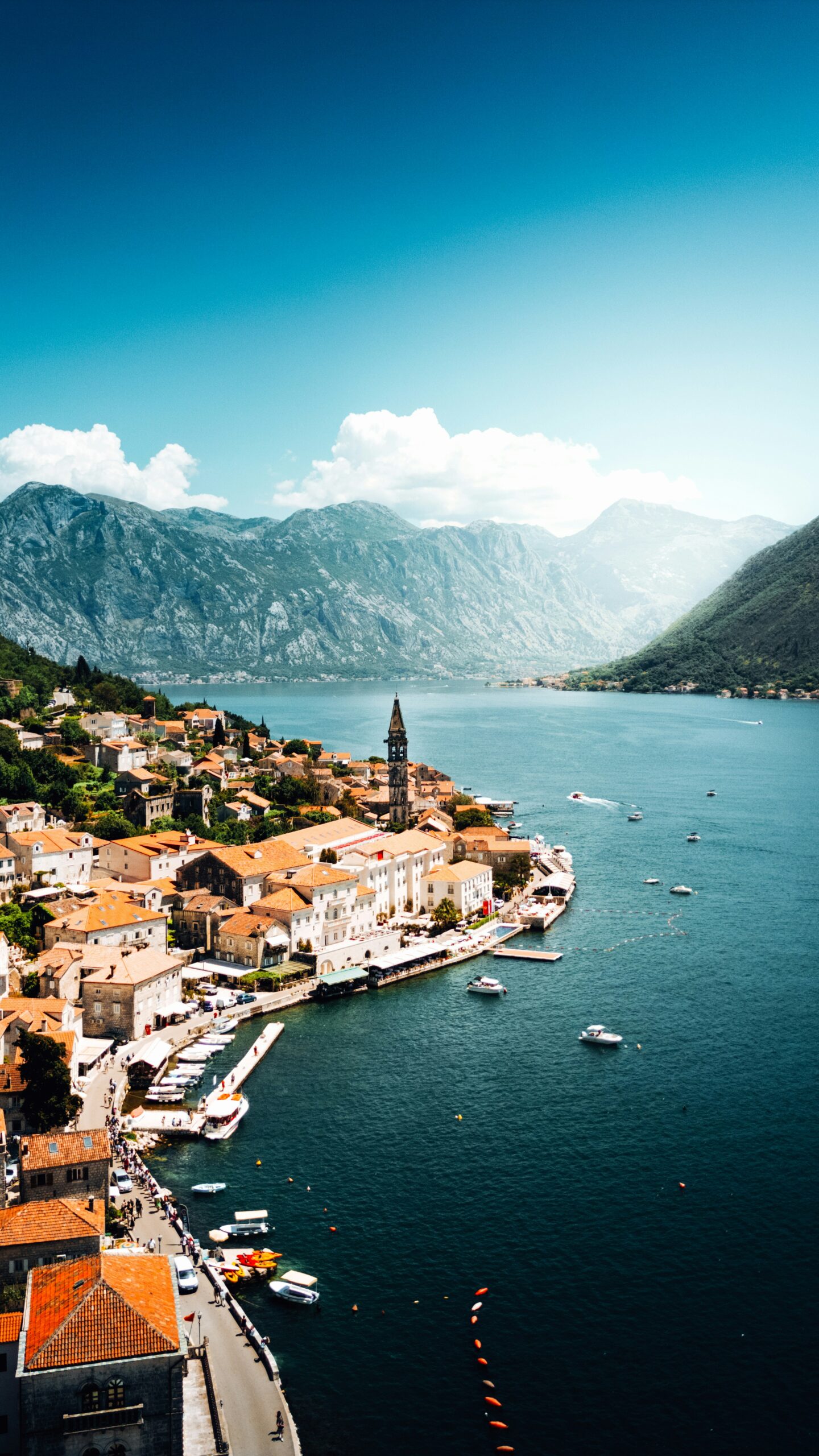 an aerial view of a town on the water